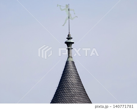 Clear sky view emphasizing minimalist rooftop structure with metal accents and textured shingles Clear sky view emphasizing minimalist rooftop structure with metal accents and textured shingles 140771781