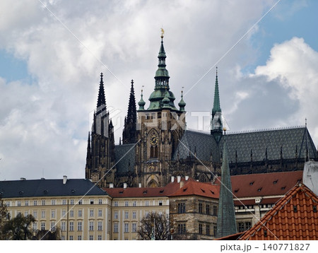 Intricate cathedral architecture detailed. Ornate stone carvings and soaring copper pinnacles displayed Intricate cathedral architecture detailed. Ornate stone carvings and soaring copper pinnacles displayed 140771827