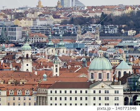 Vivid domes amidst city settings. Colorful towers and old structures dominate lively urban areas Vivid domes amidst city settings. Colorful towers and old structures dominate lively urban areas 140771846
