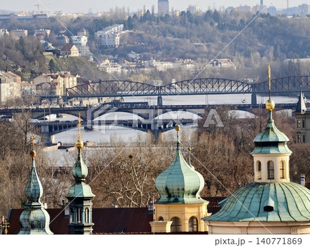 Historic bridges and domed structures showcasing intricate details and vibrant patina in heritage setting 140771869