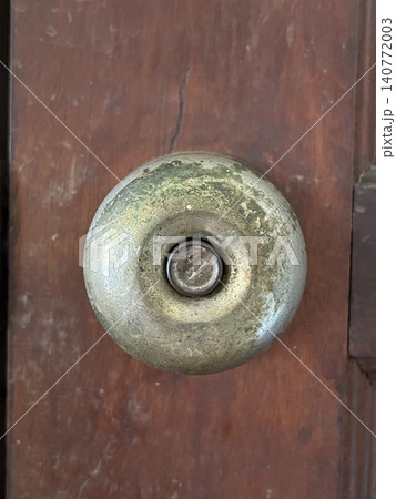 Rusty Vintage Door Knob on Wooden Door Rusty Vintage Door Knob on Wooden Door 140772003