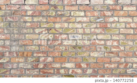 A beautiful wall of old multicolored shabby bricks. Texture of dilapidated brickwork. A beautiful wall of old multicolored shabby bricks. Texture of dilapidated brickwork. 140772258