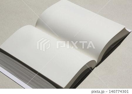 It is a close-up of an open book. It is a close-up of an open book. 140774301