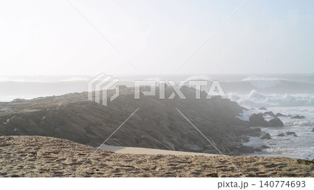 The sea rises to the seafront of Furadouro in Ovar The sea rises to the seafront of Furadouro in Ovar 140774693