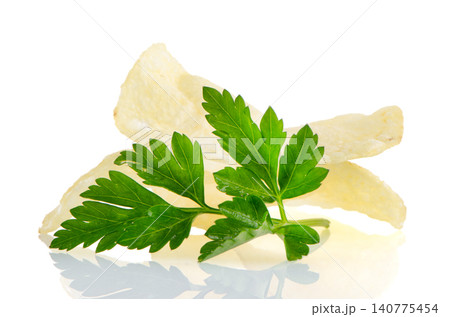 Potato chips and parsley Potato chips and parsley 140775454