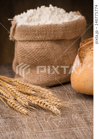 Rustic bread and wheat 140775774