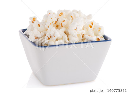 Popcorn in a white bowl Popcorn in a white bowl 140775851