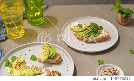 Toast with avocado cream cheese and wheat bread 140776256