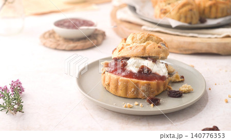 Scones with Strawberry Jam and Clotted Cream Scones with Strawberry Jam and Clotted Cream 140776353