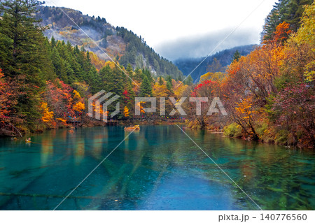 Colorful Forest and Turquoise Lake in Jiuzhaigou, UNESCO World Heritage Site Colorful Forest and Turquoise Lake in Jiuzhaigou, UNESCO World Heritage Site 140776560
