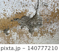Damaged Wall with Cracks and Peeling Layers 140777210