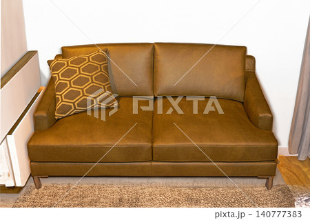 Brown sofa in modern interior 140777383