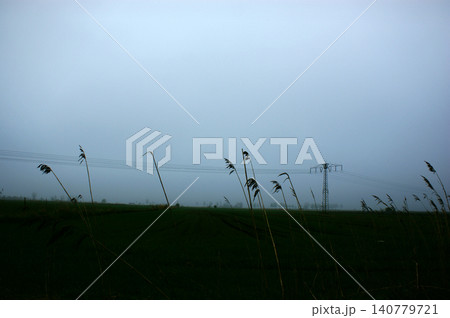 misty gloomy landscape cloudy sky field 140779721