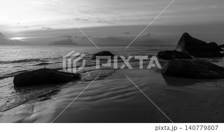 Black and white landscape photography with black rocks Black and white landscape photography with black rocks 140779807