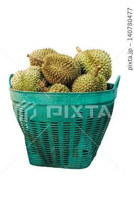 Whole fresh durians in a green plastic basket, isolated on white background. 140780477