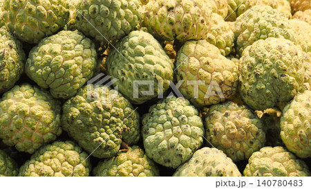 Full frame background of fresh sugar apples, top view of harvested green custard apples texture. Full frame background of fresh sugar apples, top view of harvested green custard apples texture. 140780483