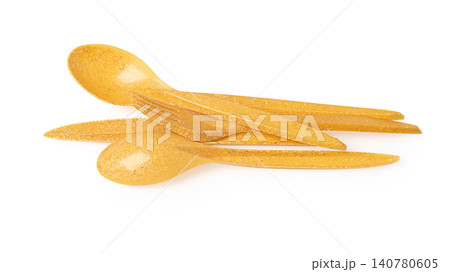 Yellow plastic disposable cutlery set for picnics and parties 140780605