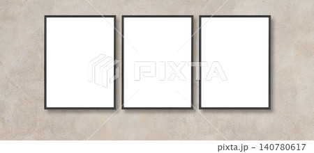 Three blank picture frames on concrete wall mockup Three blank picture frames on concrete wall mockup 140780617