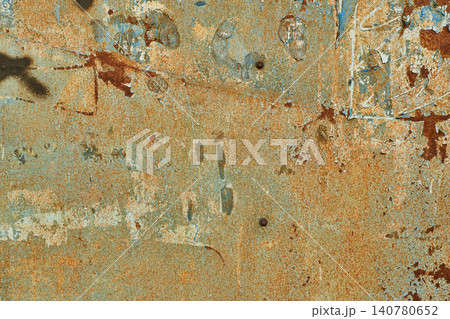 Heavy rust on blue metal sheet. Peeling paint iron plate background. Old rusty billboard texture. 140780652