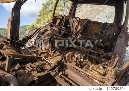 Rusted Interior of a Wrecked Off Road Vehicle. 140780804
