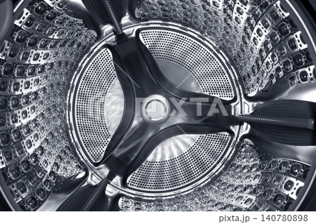 Inside of the washing machine drum . Inside of the washing machine drum . 140780898