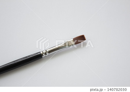 Acrylic brush on a white background. Acrylic brush on a white background. 140782030