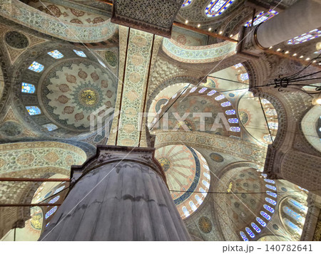 Ornate mosque interior ceiling with domes and arches Ornate mosque interior ceiling with domes and arches 140782641