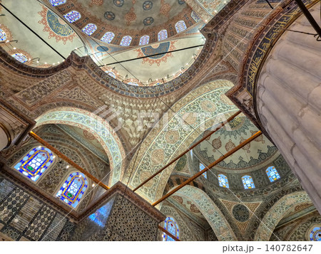 Ornate mosque interior with decorative domed ceiling Ornate mosque interior with decorative domed ceiling 140782647