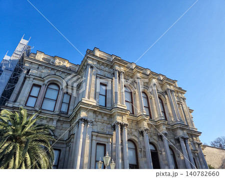 Historic ornate building facade with blue sky Historic ornate building facade with blue sky 140782660