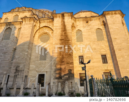 Historic mosque exterior with ornate stone facade Historic mosque exterior with ornate stone facade 140782698