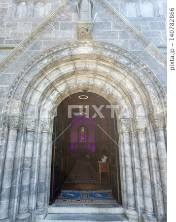 Ornate Stone Church Entrance With Gothic Arch 140782866