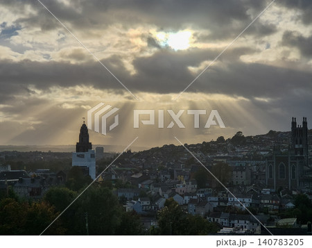 Sunbeams Over City Skyline at Dramatic Sunset Sunbeams Over City Skyline at Dramatic Sunset 140783205
