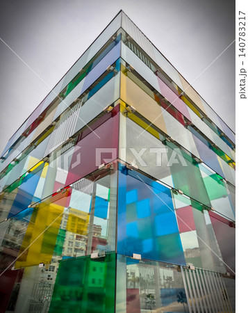 Colorful modern glass building facade Colorful modern glass building facade 140783217