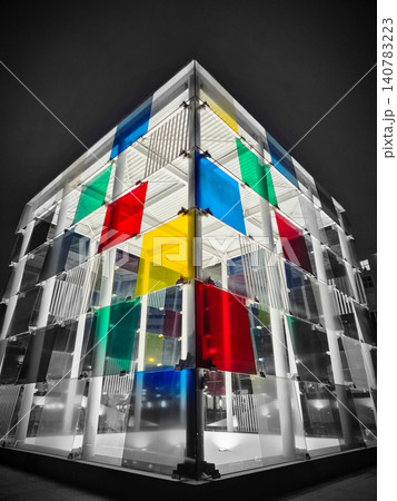 Colorful geometric glass building at night 140783223