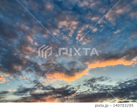 Colorful Dramatic Clouds at Sunset Sky Colorful Dramatic Clouds at Sunset Sky 140783295