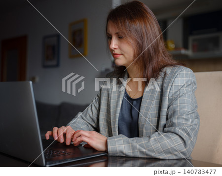 Remote Working Mother Balancing Home and Career 140783477