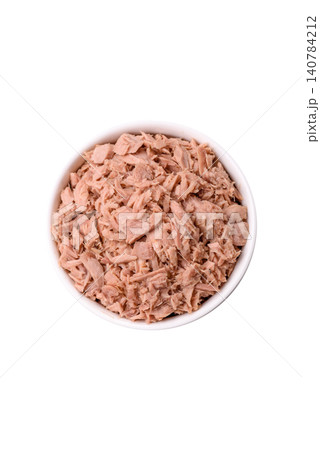 Fish, canned tuna chunks in brine for sandwiches and salads. Canned tuna Fish, canned tuna chunks in brine for sandwiches and salads. Canned tuna 140784212