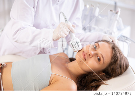Facial procedure to European girl (ice hummer) 140784975