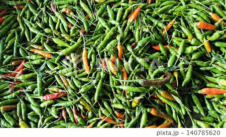 Abundance of Fresh Green Bird's Eye Chilies Background Abundance of Fresh Green Bird's Eye Chilies Background 140785620