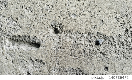 Damaged Rough Concrete Texture with Cracks and Loose Stones Damaged Rough Concrete Texture with Cracks and Loose Stones 140786472