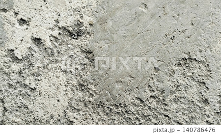 Damaged Rough Concrete Texture with Cracks and Loose Stones Damaged Rough Concrete Texture with Cracks and Loose Stones 140786476
