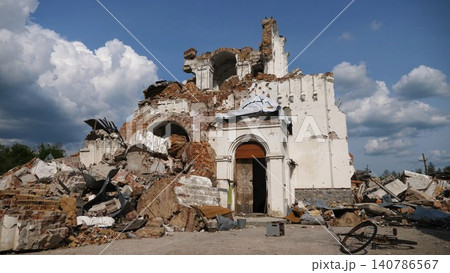 View to destroyed church at Kharkivska oblast. Ruined building after bomb attacks on ukrainian territory from russia army. Consequences of russian invasion of Ukraine. Slow motion View to destroyed church at Kharkivska oblast. Ruined building after bomb attacks on ukrainian territory from russia army. Consequences of russian invasion of Ukraine. Slow motion 140786567