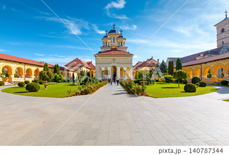 alba iulia, romania - 13 oct 2019: coronation cathedral. holy trinity romanian orthodox cathedral located in alba iulia citadel. sunny autumn day. popular travel destination in europe alba iulia, romania - 13 oct 2019: coronation cathedral. holy trinity romanian orthodox cathedral located in alba iulia citadel. sunny autumn day. popular travel destination in europe 140787344
