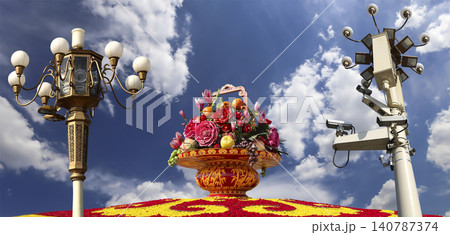 Street lamp and huge flower basket (against the background of a beautiful sky with clouds) in Tiananmen square, Beijing, China Street lamp and huge flower basket (against the background of a beautiful sky with clouds) in Tiananmen square, Beijing, China 140787374