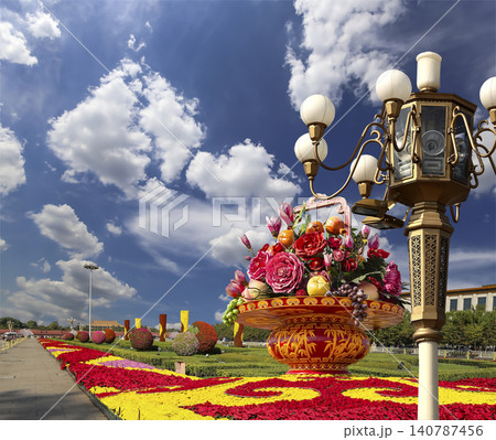 Street lamp and huge flower basket (against the background of a beautiful sky with clouds) in Tiananmen square, Beijing, China Street lamp and huge flower basket (against the background of a beautiful sky with clouds) in Tiananmen square, Beijing, China 140787456