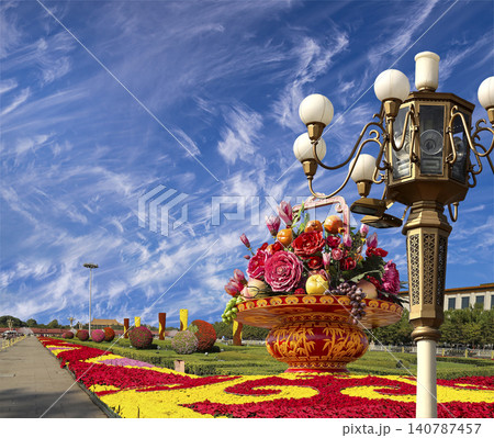 Street lamp and huge flower basket (against the background of a beautiful sky with clouds) in Tiananmen square, Beijing, China Street lamp and huge flower basket (against the background of a beautiful sky with clouds) in Tiananmen square, Beijing, China 140787457