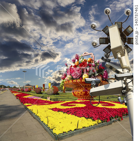 Street lamp and huge flower basket (against the background of a beautiful sky with clouds) in Tiananmen square, Beijing, China Street lamp and huge flower basket (against the background of a beautiful sky with clouds) in Tiananmen square, Beijing, China 140787461