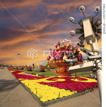 Street lamp and huge flower basket (against the sunset) in Tiananmen square, Beijing, China Street lamp and huge flower basket (against the sunset) in Tiananmen square, Beijing, China 140787462