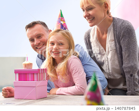 Portrait, family or cake at happy birthday, party or candle as love, bonding or together outside. Papa, mama or girl as smile at box, gift or celebration of congratulations, childhood or growth Portrait, family or cake at happy birthday, party or candle as love, bonding or together outside. Papa, mama or girl as smile at box, gift or celebration of congratulations, childhood or growth 140787845