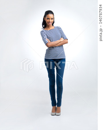 Businesswoman, portrait and fashion in studio for confidence, casual outfit and trendy for style. Female person, smile and happy on white background for cool, stylish and woman with arms crossed Businesswoman, portrait and fashion in studio for confidence, casual outfit and trendy for style. Female person, smile and happy on white background for cool, stylish and woman with arms crossed 140787934